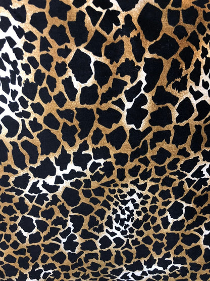 Giraffe design print on good quality stretch velvet 4way 58/60" Sold by the YD. Ships worldwide from Los Angeles California USA.