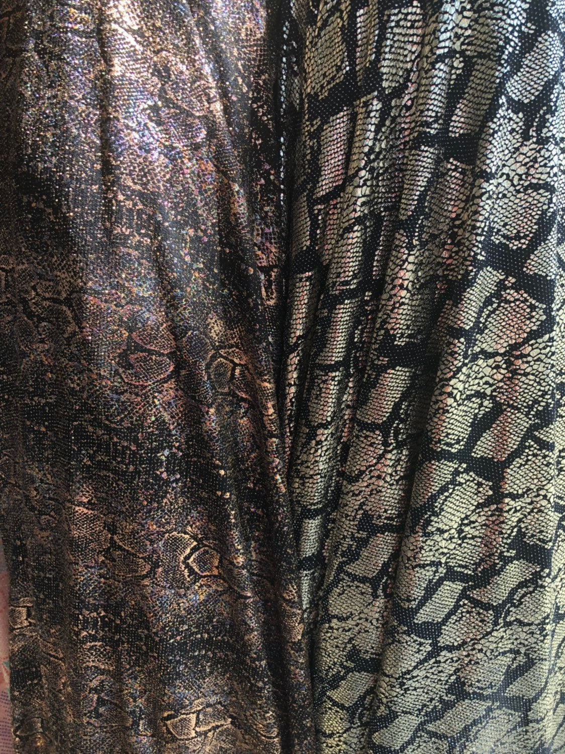 New iridescent snake design foil on slinky spandex 4way stretch 58/60" Sold by the YD. Ships worldwide from Los Angeles California USA.