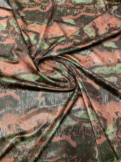 Anaconda snake design nylon spandex with clear foil 4way stretch 58/60" Sold by the YD. Ships worldwide from Los Angeles California USA.