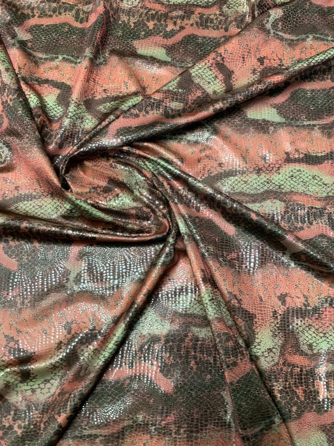 Anaconda snake design nylon spandex with clear foil 4way stretch 58/60" Sold by the YD. Ships worldwide from Los Angeles California USA.