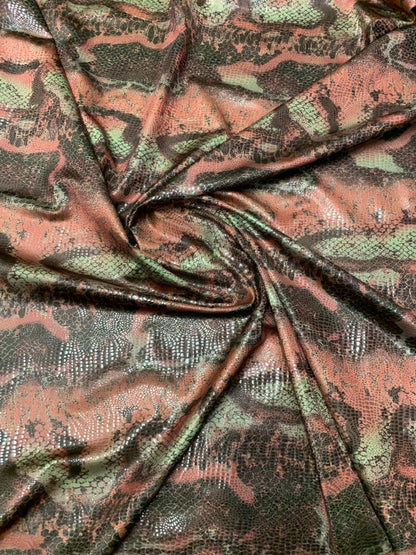 Anaconda snake design nylon spandex with clear foil 4way stretch 58/60" Sold by the YD. Ships worldwide from Los Angeles California USA.