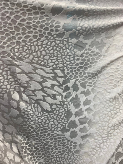 Burnout velvet animal print design white color 4way stretch 58/60" Sold by the Yd. Ships worldwide from Los Angeles California USA.