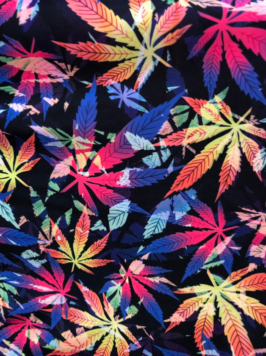Marijuana cannabis leaf design print on nylon spandex 4way stretch 58/60" Sold by the YD. Ships worldwide from Los Angeles California USA.