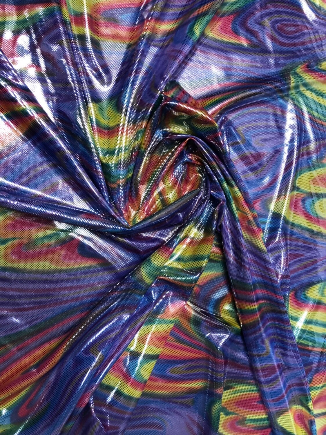 Paisley rainbow design metallic nylon spandex with foil dots 4way stretch 58/60" Sold by the YD. Ships worldwide from Los Angeles California