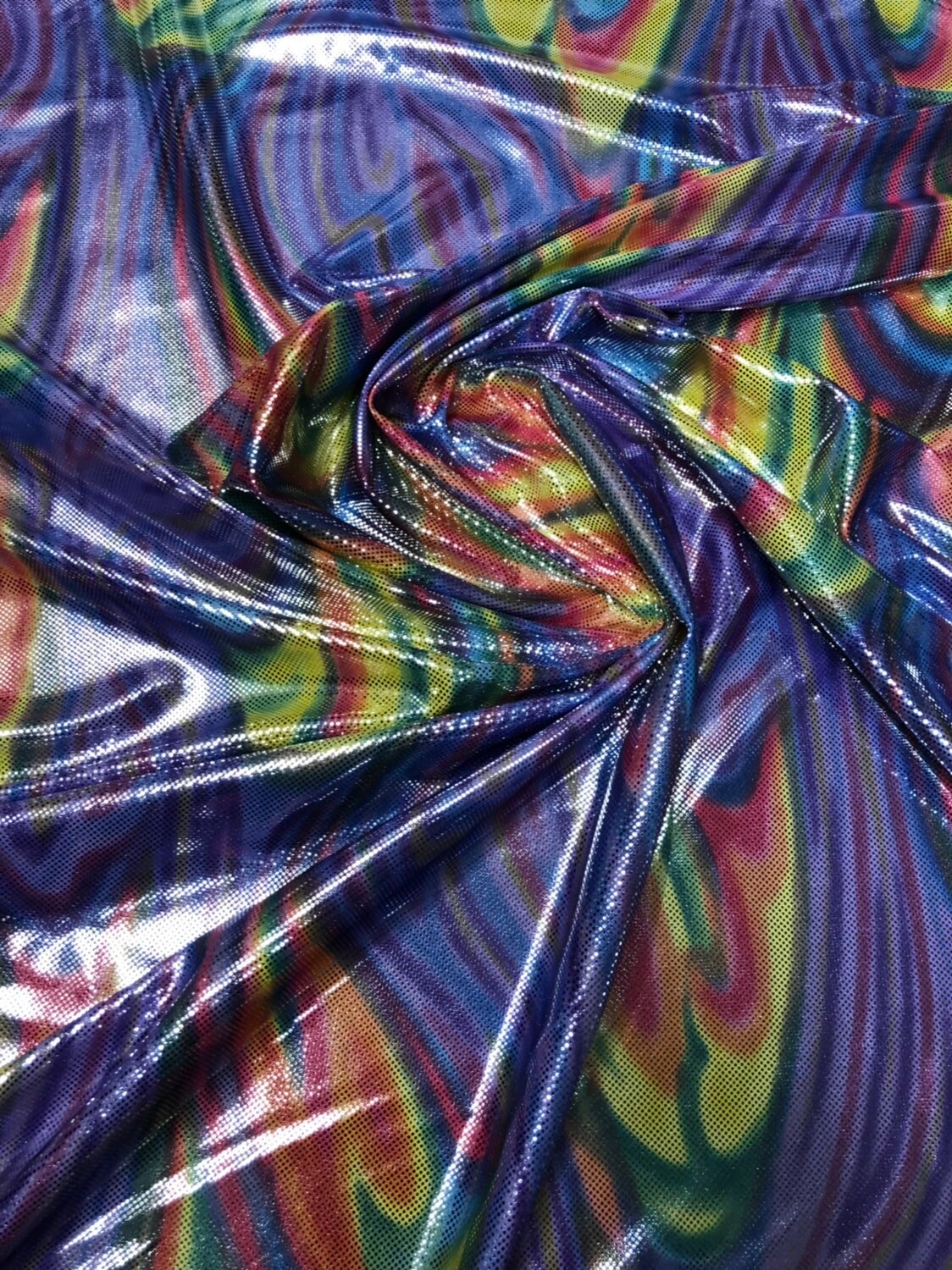 Paisley rainbow design metallic nylon spandex with foil dots 4way stretch 58/60" Sold by the YD. Ships worldwide from Los Angeles California
