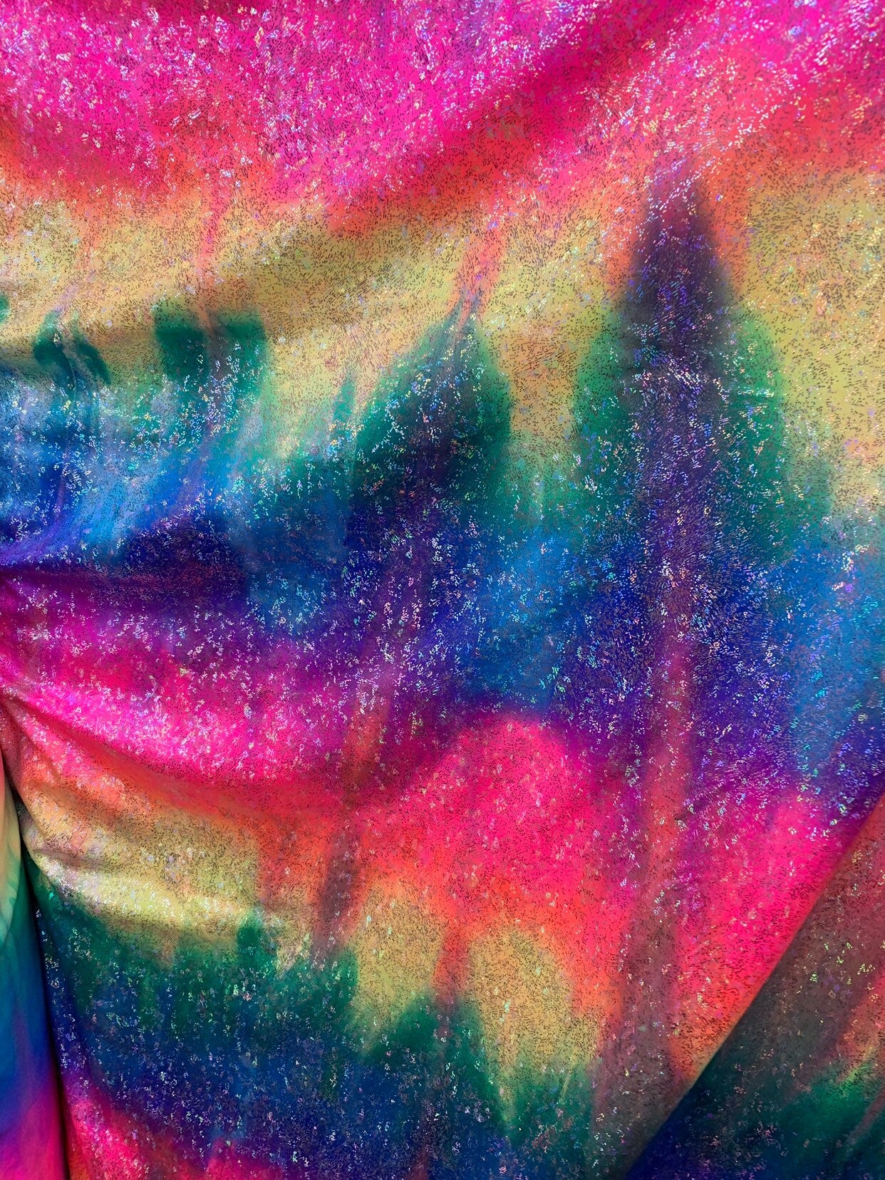 Fireworks foil design hologram metallic tie dye nylon spandex 4way stretch 58/60" Sold by the YD. Ships worldwide from Los Angeles CA USA.