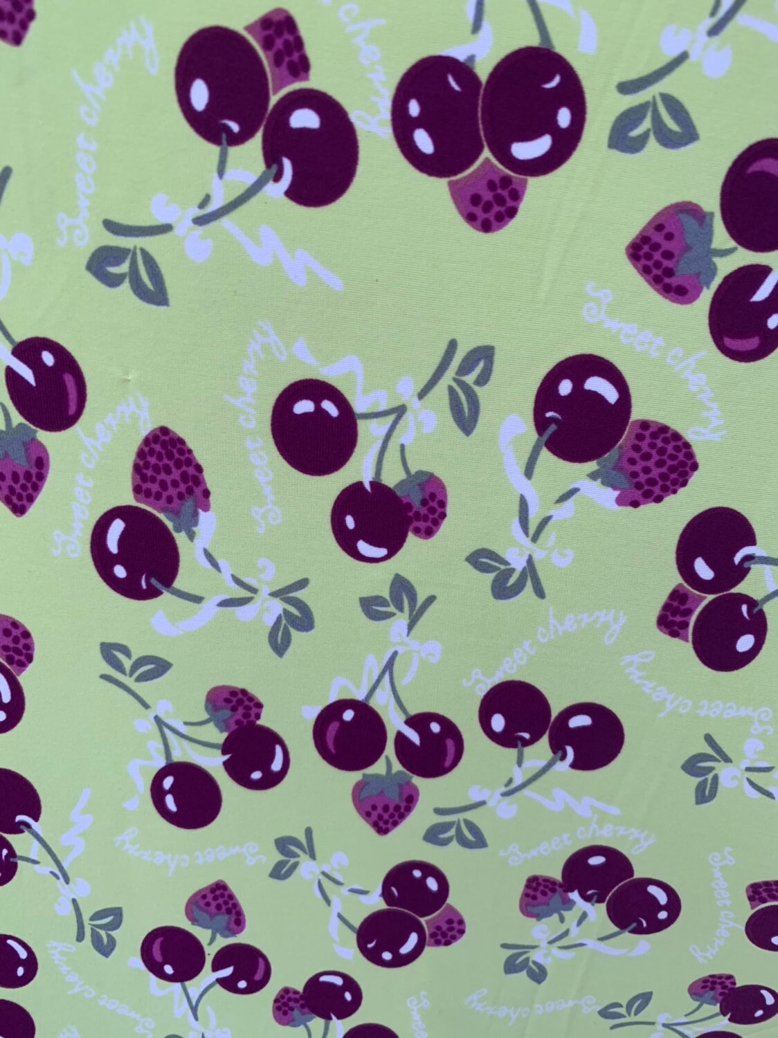 Sweet cherry design print on nylon spandex 4way stretch 58/60" Sold by the YD. Ships worldwide from Los Ángeles California USA.
