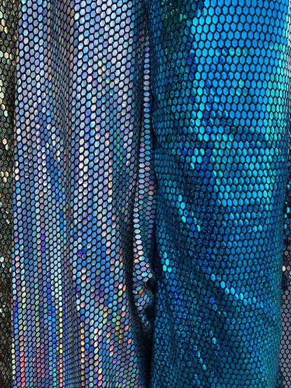 Metallic spandex with hexagon hologram sequins 2way stretch 58/60" Sold by the YD. Ships worldwide from Los Angeles California USA.