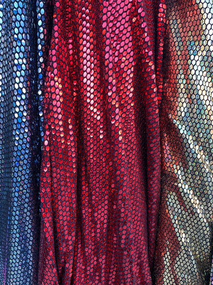 Metallic spandex with hexagon hologram sequins 2way stretch 58/60" Sold by the YD. Ships worldwide from Los Angeles California USA.