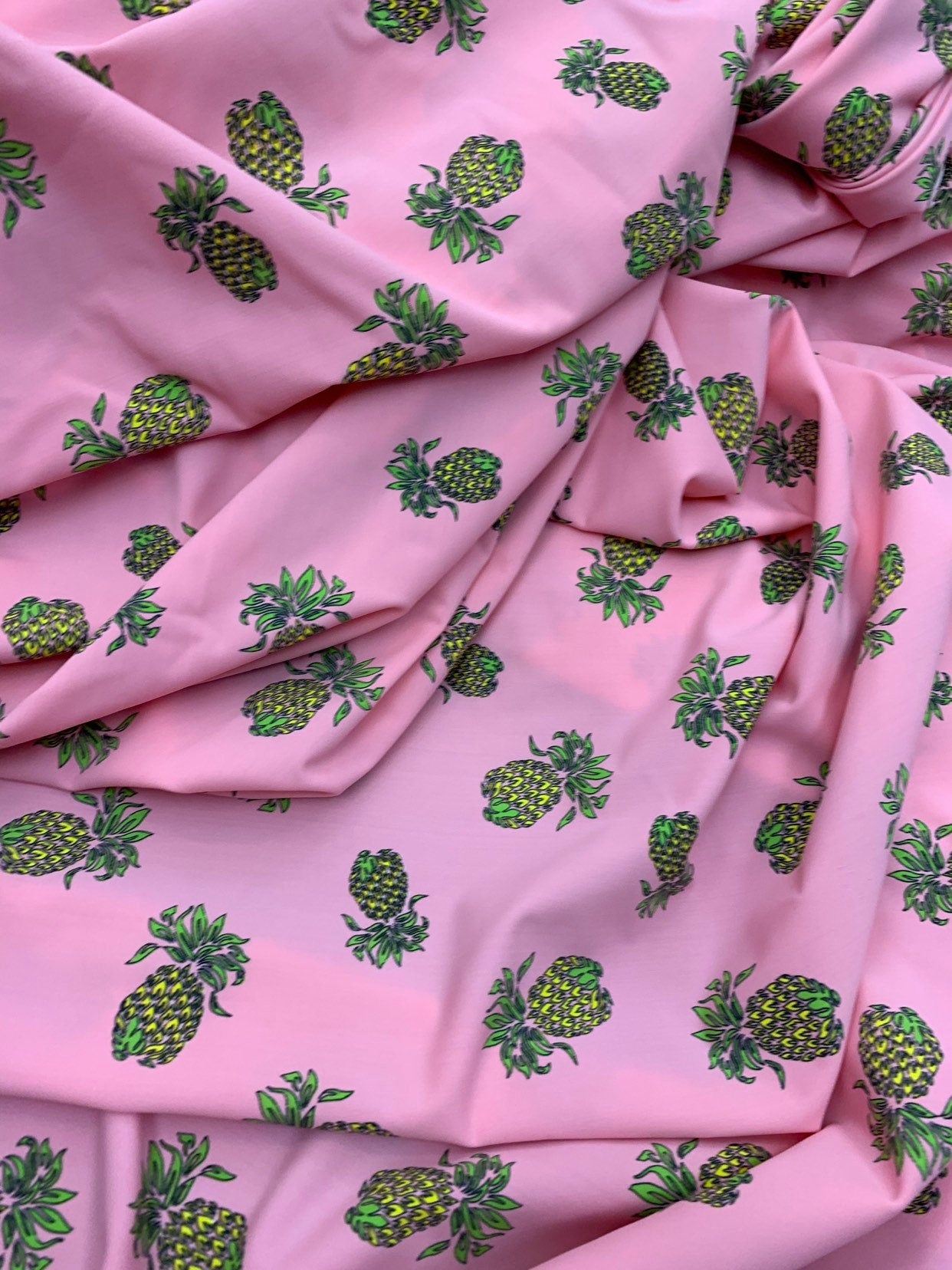 Pineapple design blush pink print on nylon spandex 4way stretch 58/60" Sold by the YD. Ships worldwide from Los Ángeles California USA.