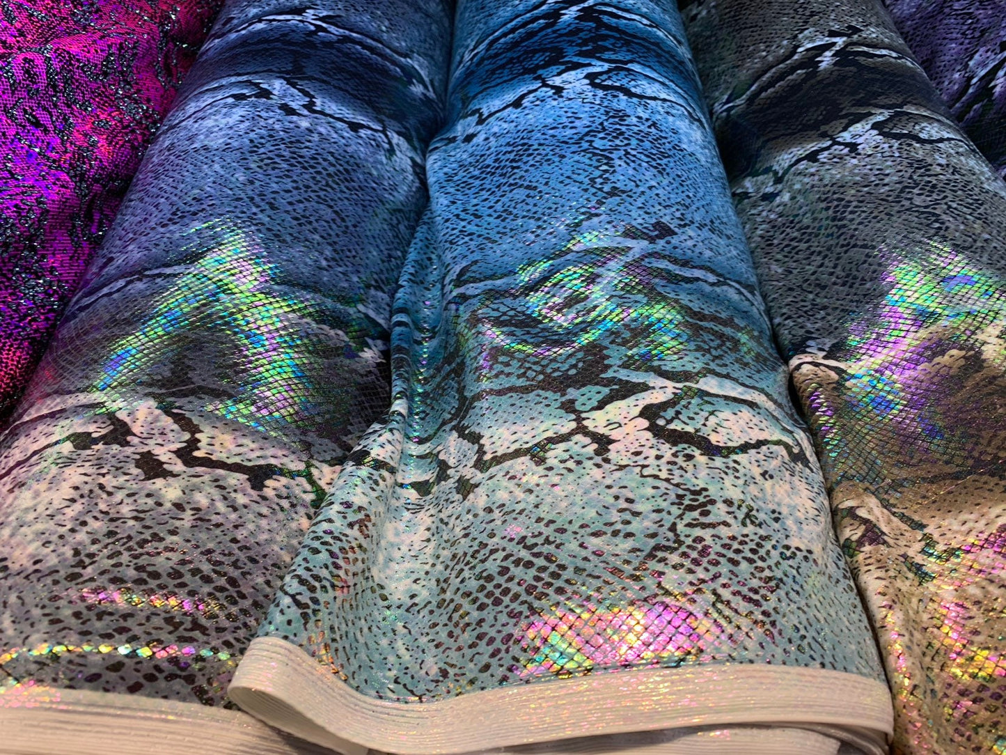 King snake design with iridescent foil nylon spandex 4way stretch 58/60" Sold by the YD. Ships worldwide from Los Angeles California USA.