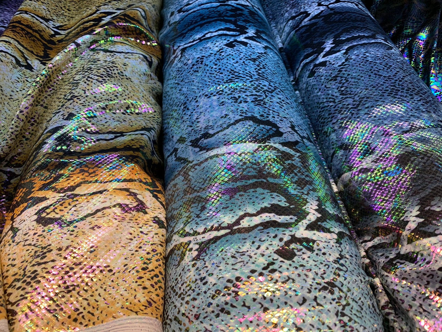King snake design with iridescent foil nylon spandex 4way stretch 58/60" Sold by the YD. Ships worldwide from Los Angeles California USA.