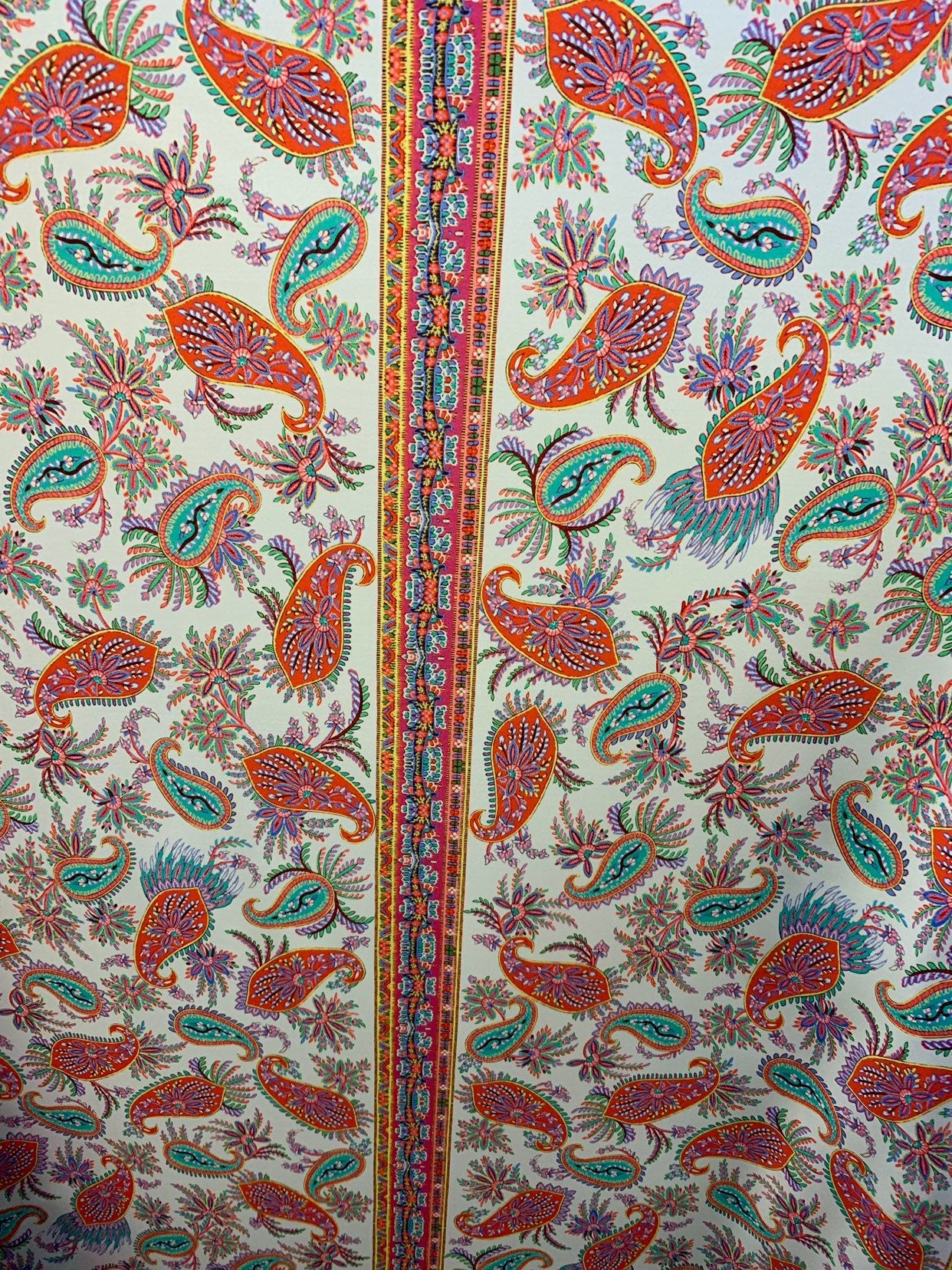 Paisley design multicolor print nylon spandex 4way stretch 58/60" Sold by the YD. Ships worldwide from Los Angeles California USA.