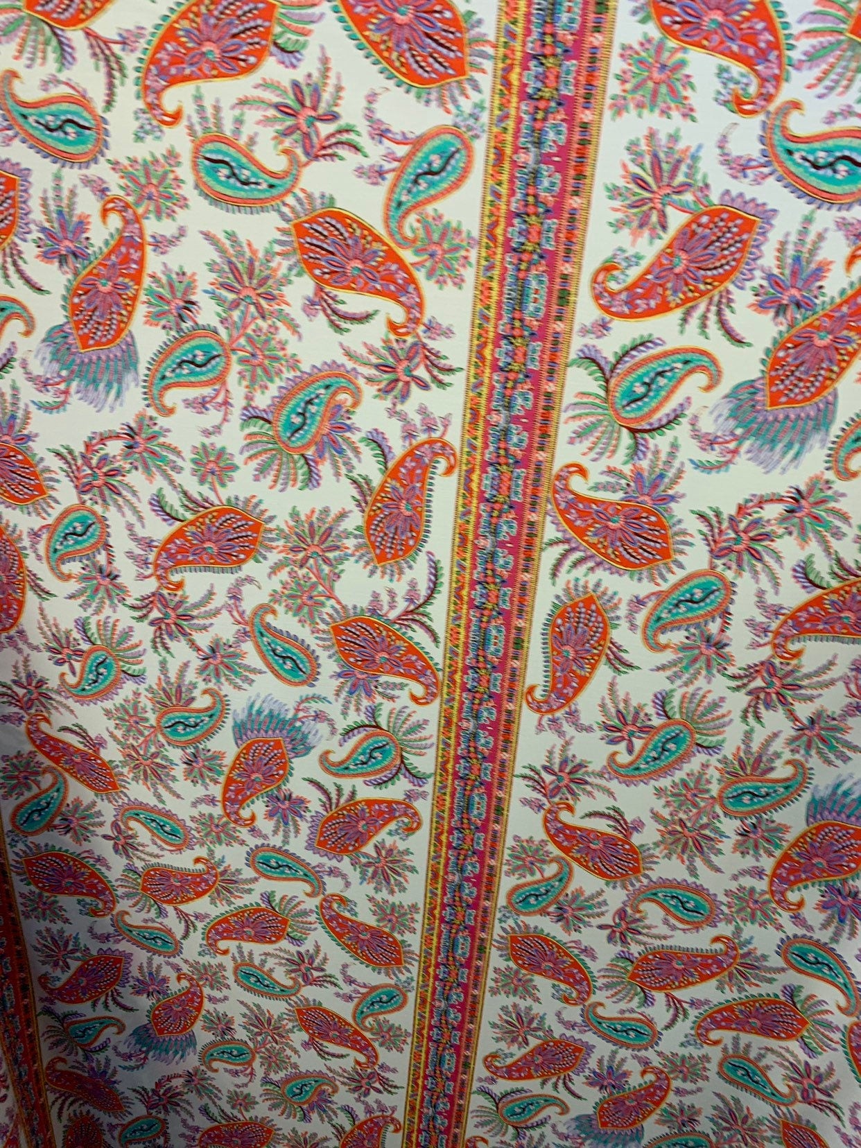 Paisley design multicolor print nylon spandex 4way stretch 58/60" Sold by the YD. Ships worldwide from Los Angeles California USA.
