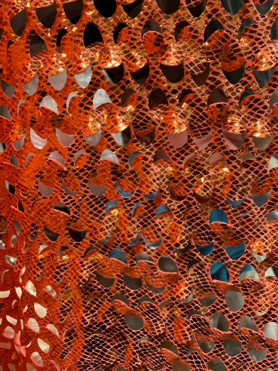 Lacer cut orange/gold stretch velvet with foil 4way stretch 58/60" Sold by the YD. Ships worldwide from Los Angeles California USA.