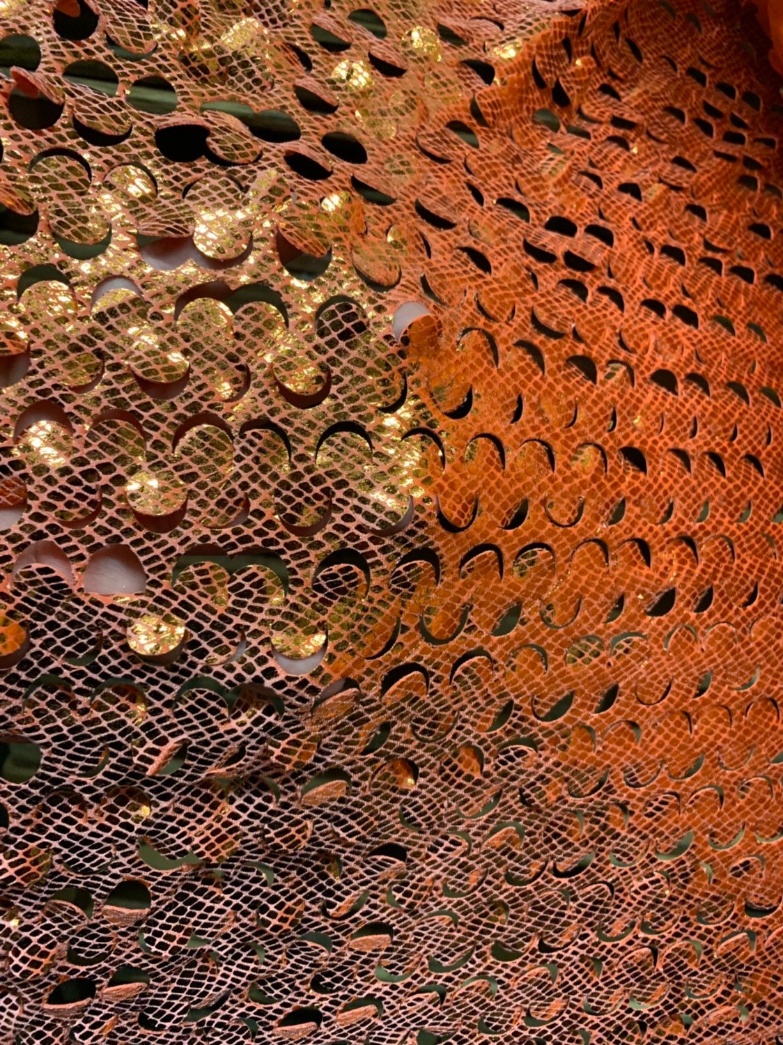 Lacer cut orange/gold stretch velvet with foil 4way stretch 58/60" Sold by the YD. Ships worldwide from Los Angeles California USA.