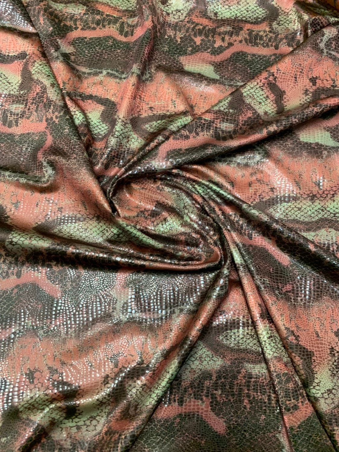 Anaconda snake design nylon spandex with clear foil 4way stretch 58/60" Sold by the YD. Ships worldwide from Los Angeles California USA.