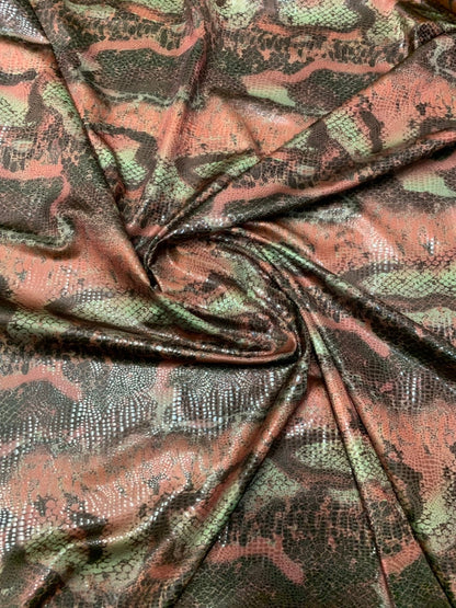 Anaconda snake design nylon spandex with clear foil 4way stretch 58/60" Sold by the YD. Ships worldwide from Los Angeles California USA.