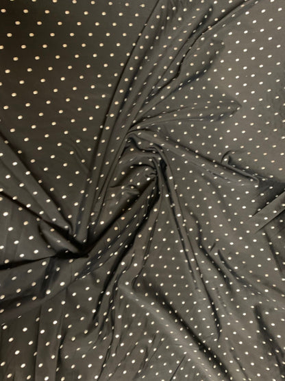Metallic dots on heavy nylon spandex 4way stretch 58/60" Sold by the YD. Ships worldwide from Los Angeles California USA.