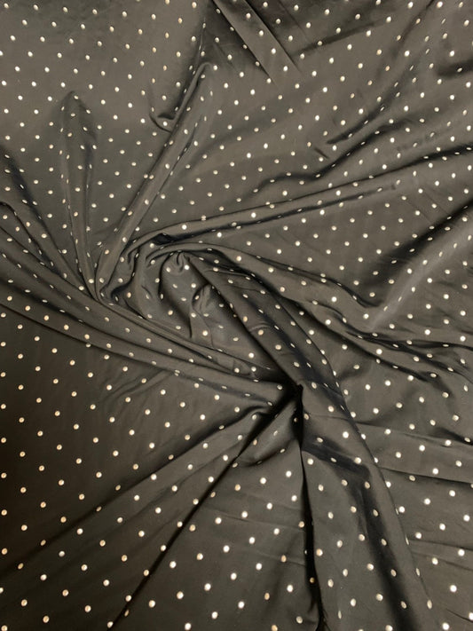 Metallic dots on heavy nylon spandex 4way stretch 58/60" Sold by the YD. Ships worldwide from Los Angeles California USA.