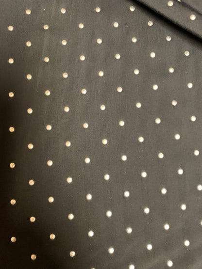 Metallic dots on heavy nylon spandex 4way stretch 58/60" Sold by the YD. Ships worldwide from Los Angeles California USA.
