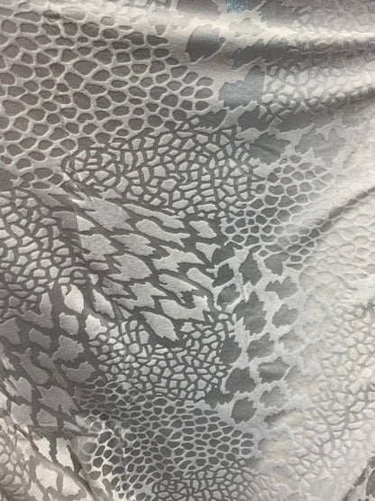 Burnout velvet animal print design white color 4way stretch 58/60" Sold by the Yd. Ships worldwide from Los Angeles California USA.