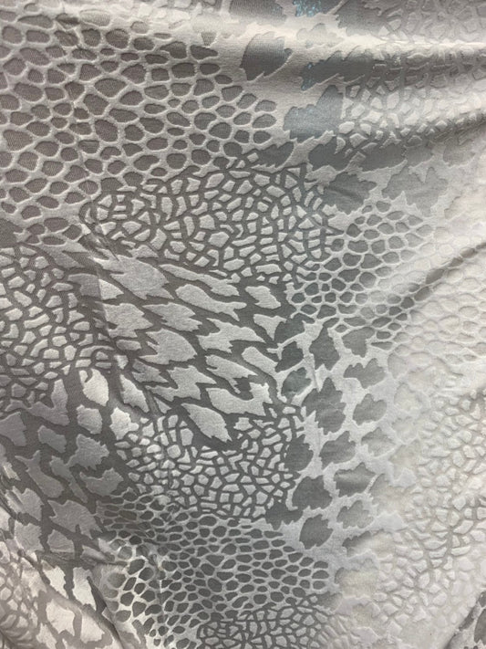 Burnout velvet animal print design white color 4way stretch 58/60" Sold by the Yd. Ships worldwide from Los Angeles California USA.
