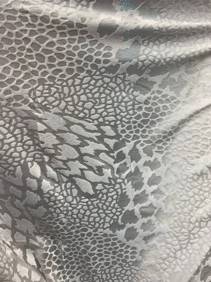 Burnout velvet animal print design white color 4way stretch 58/60" Sold by the Yd. Ships worldwide from Los Angeles California USA.