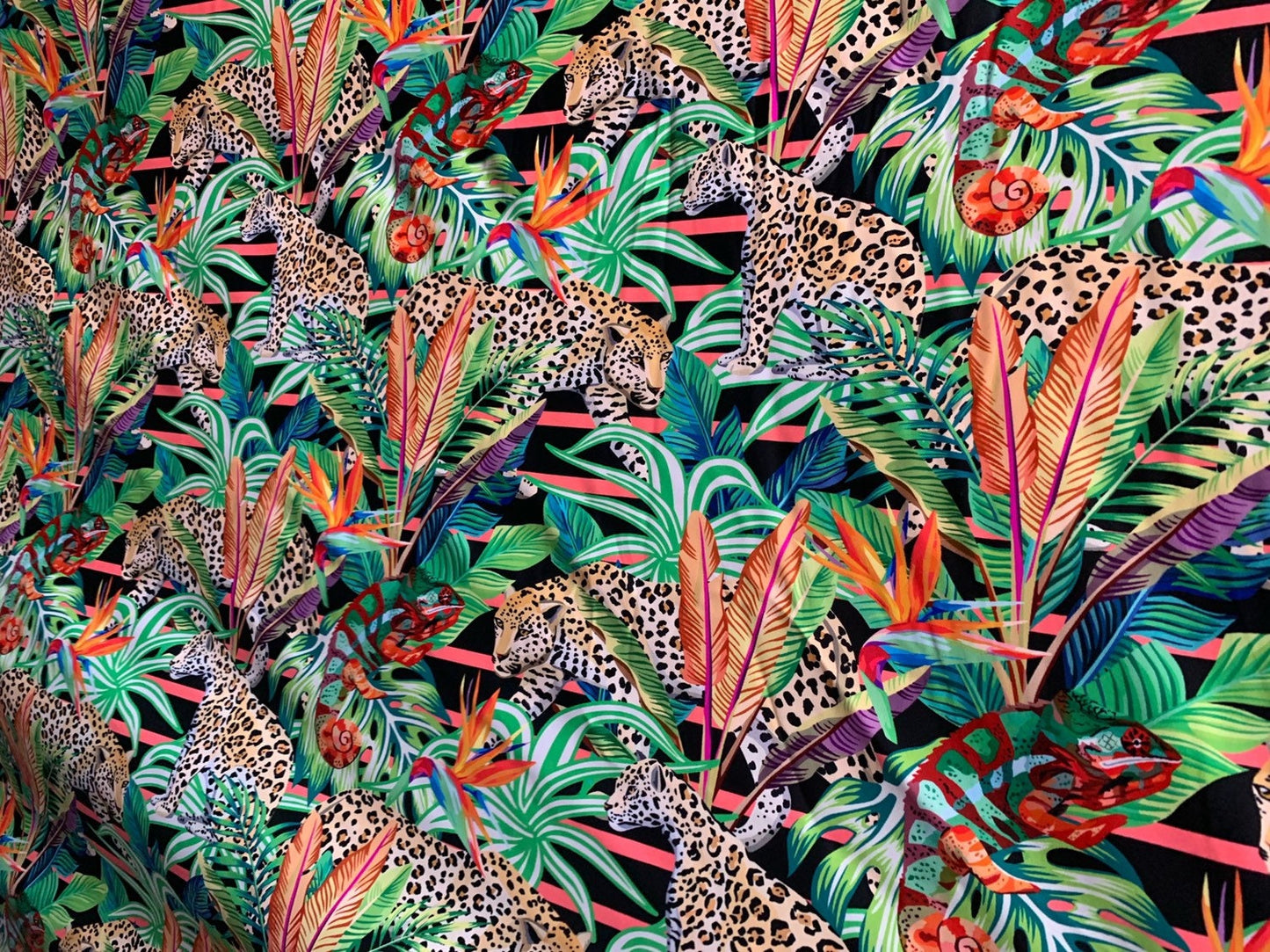 Leopard design print on heavy nylon spandex 4way stretch 58/60" Sold by the YD. Ships worldwide from Los Angeles California USA.
