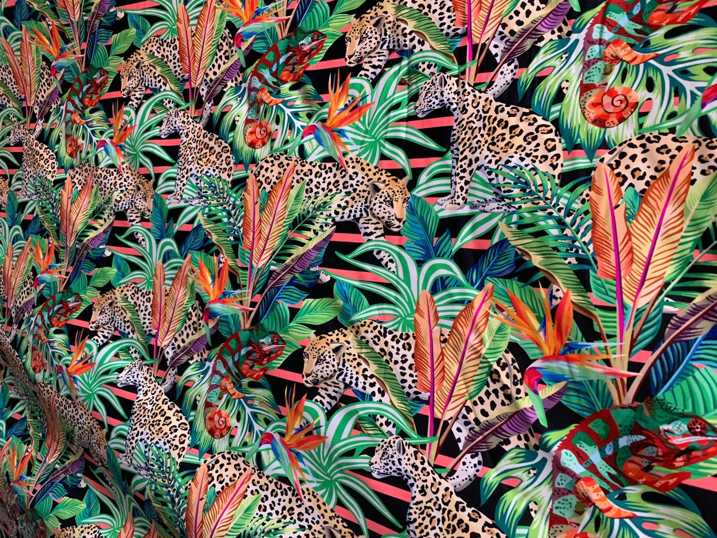 Leopard design print on heavy nylon spandex 4way stretch 58/60" Sold by the YD. Ships worldwide from Los Angeles California USA.