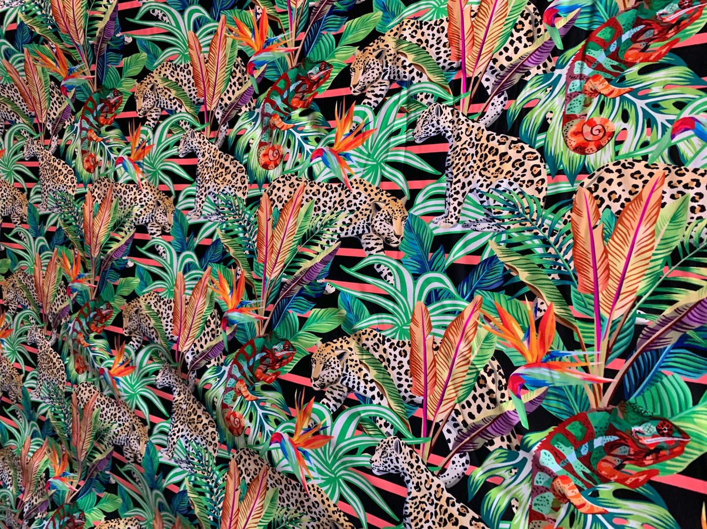 Leopard design print on heavy nylon spandex 4way stretch 58/60" Sold by the YD. Ships worldwide from Los Angeles California USA.