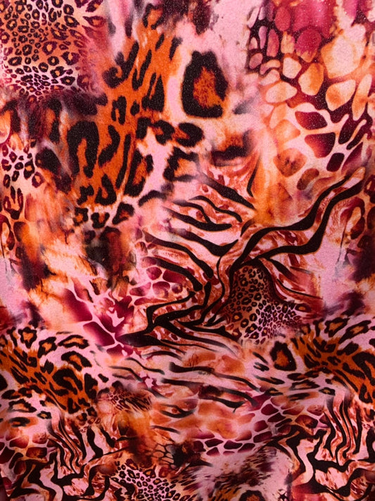 Multi animal print design on heavy stretch velvet 4way 58/60" Sold by the YD. Ships worldwide from Los Angeles California USA.