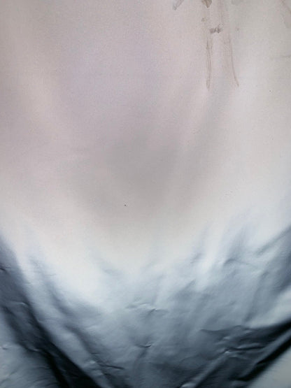 Reflective vinyl iridescent silver non stretch vinyl 58/60" Sold by the YD. Ships worldwide from Los Angeles California USA.