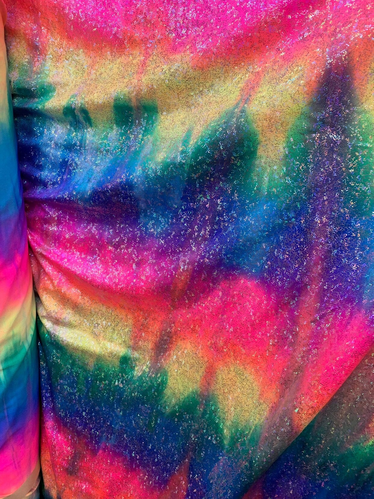 Fireworks foil design hologram metallic tie dye nylon spandex 4way stretch 58/60" Sold by the YD. Ships worldwide from Los Angeles CA USA.