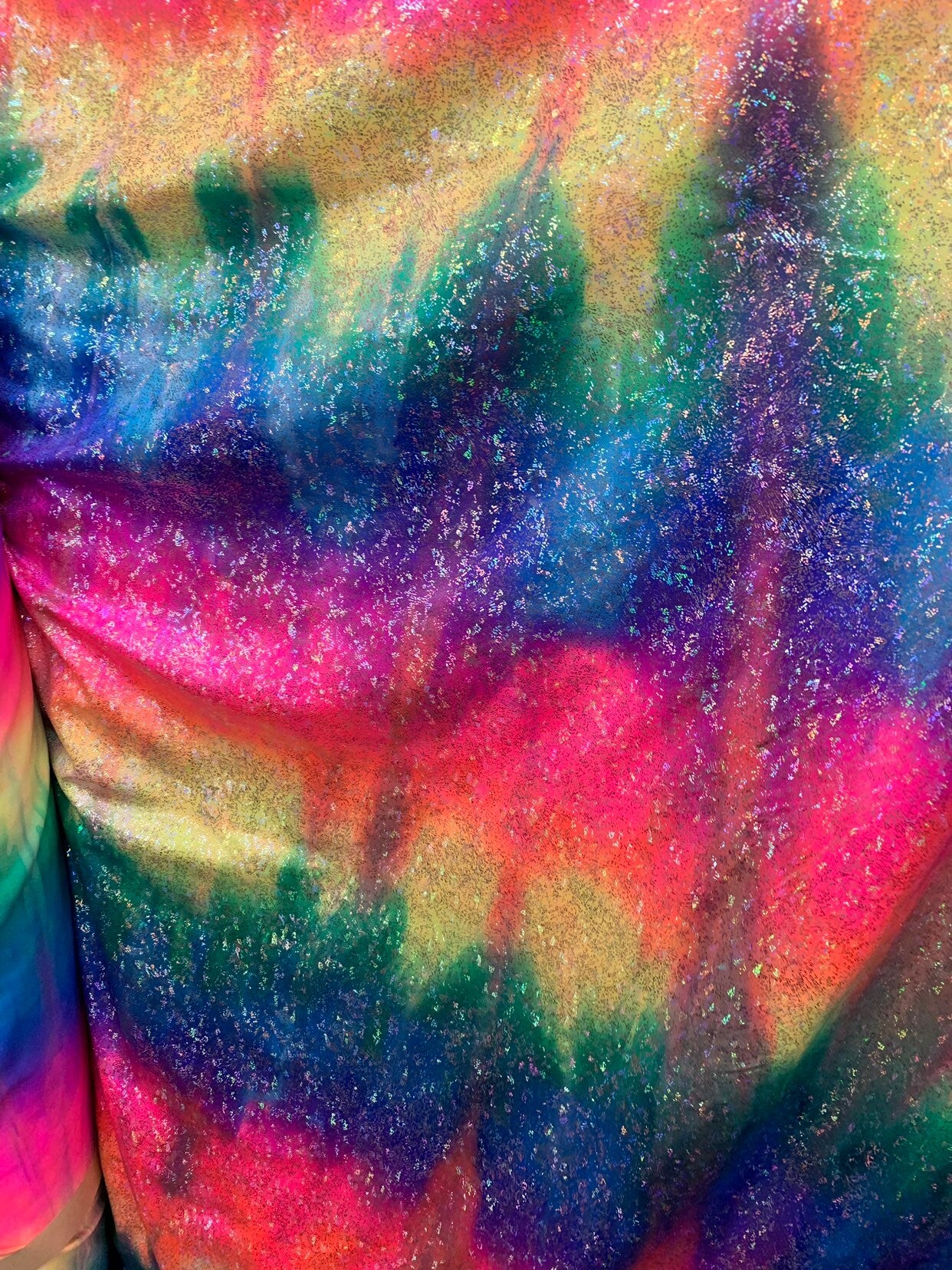 Fireworks foil design hologram metallic tie dye nylon spandex 4way stretch 58/60" Sold by the YD. Ships worldwide from Los Angeles CA USA.