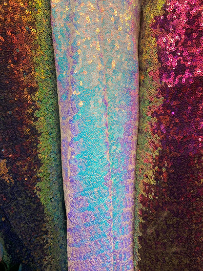 New iridescent sequins cosmic design 2tone glitz sequins on stretch power mesh 4way 58/60" Sold by the YD. Ships worldwide from Los Angeles
