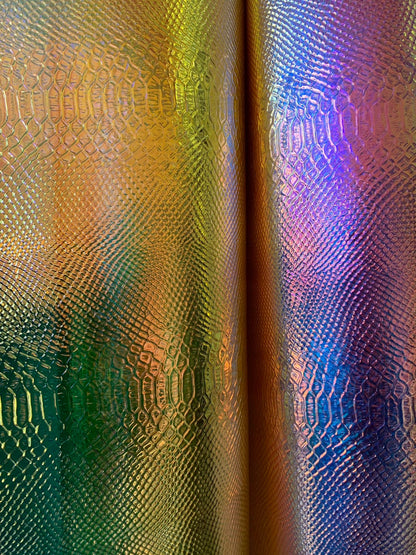New iridescent white and yellow snake design clear vinyl non stretch 48/50" Sold by the YD. Ships worldwide from Los Angeles California USA