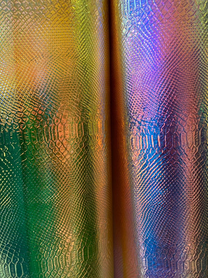 New iridescent white and yellow snake design clear vinyl non stretch 48/50" Sold by the YD. Ships worldwide from Los Angeles California USA