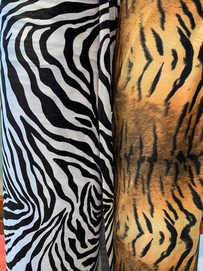 Heavy stretch velvet multi animal print 4way stretch 58/60" Sold by the YD. Ships worldwide from Los Angeles California USA.