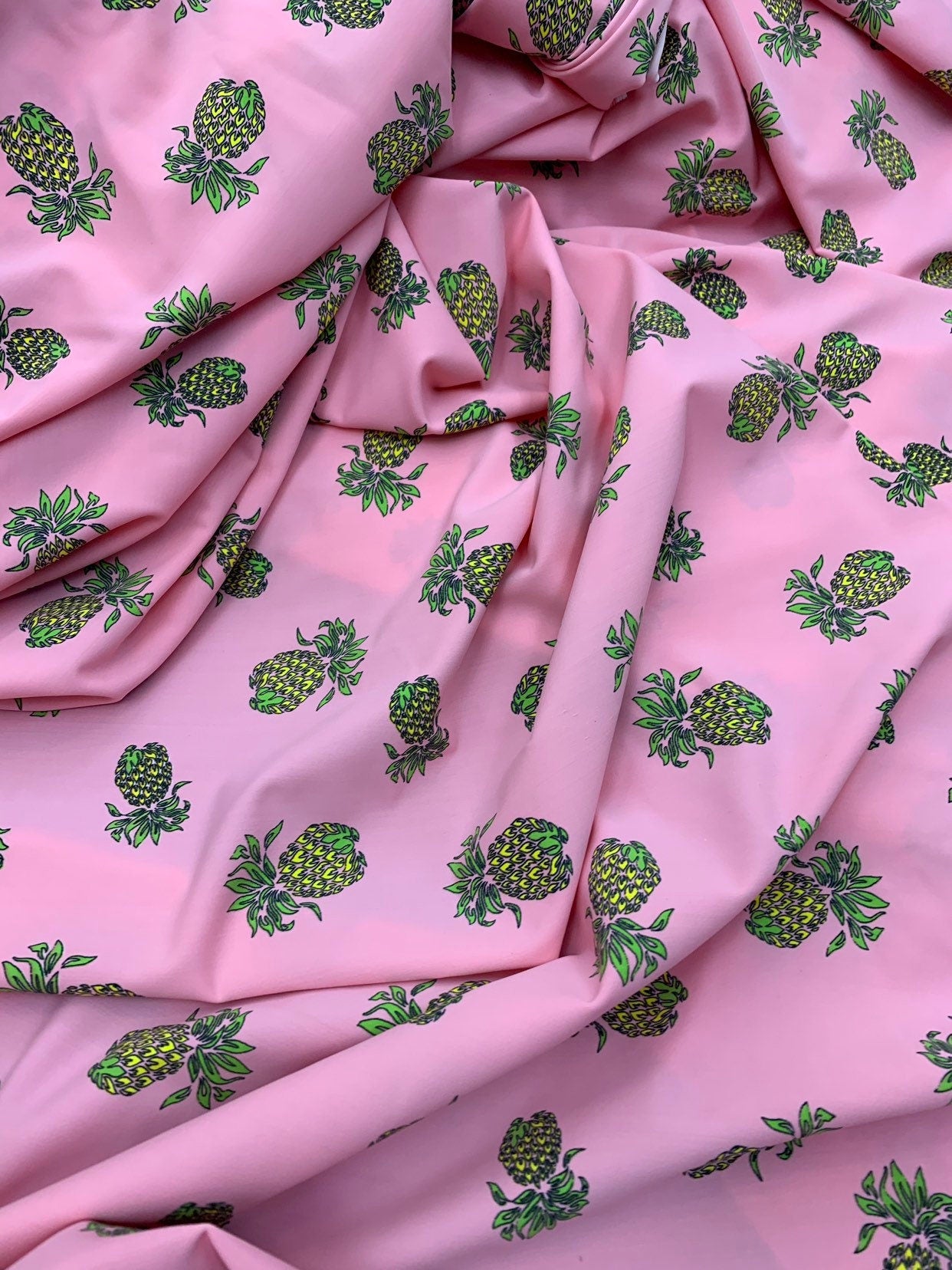 Pineapple design blush pink print on nylon spandex 4way stretch 58/60" Sold by the YD. Ships worldwide from Los Ángeles California USA.