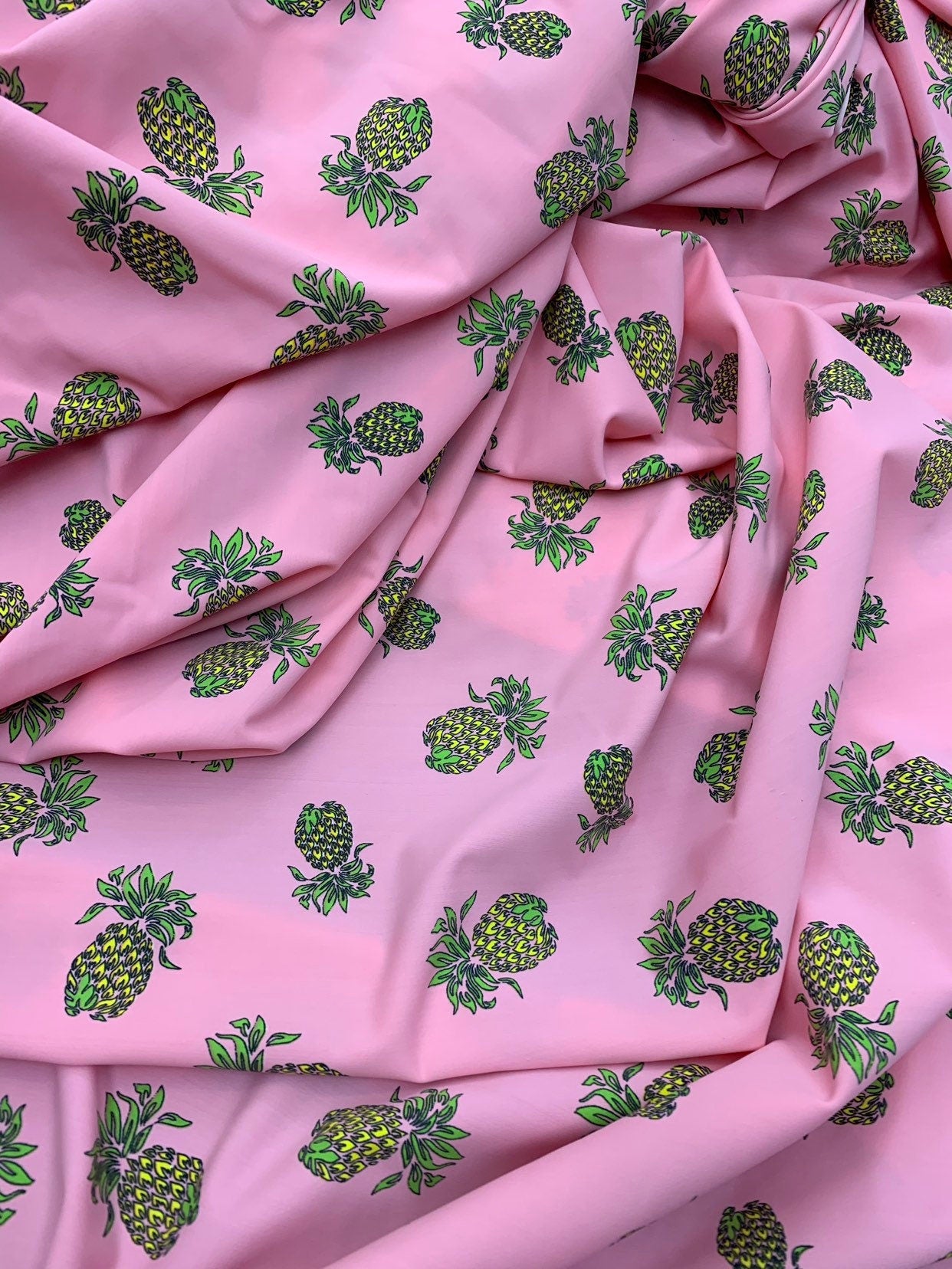 Pineapple design blush pink print on nylon spandex 4way stretch 58/60" Sold by the YD. Ships worldwide from Los Ángeles California USA.
