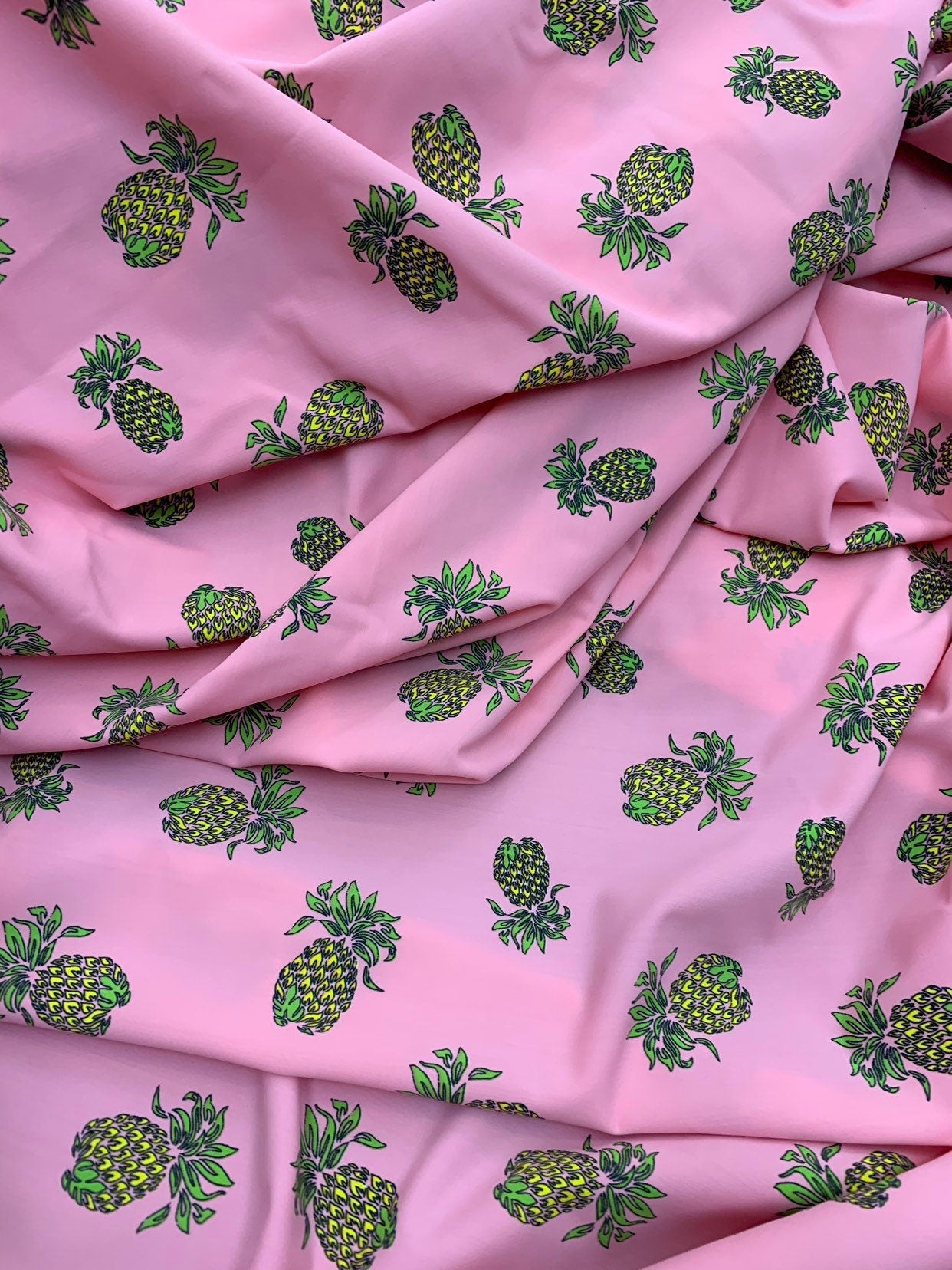 Pineapple design blush pink print on nylon spandex 4way stretch 58/60" Sold by the YD. Ships worldwide from Los Ángeles California USA.