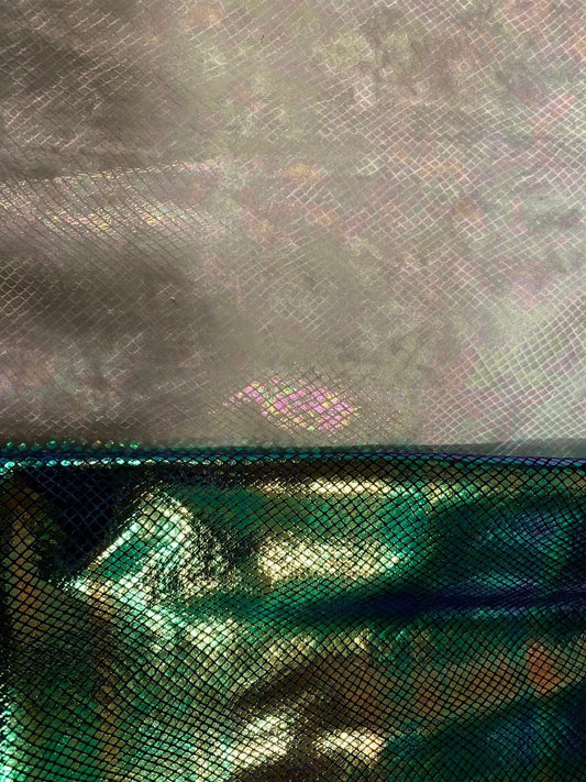 Dragon scales clear iridescent foil on heavy stretch velvet 420gsm 4way stretch 58/60" Sold by the YD. Ships worldwide from Los Angeles CA.