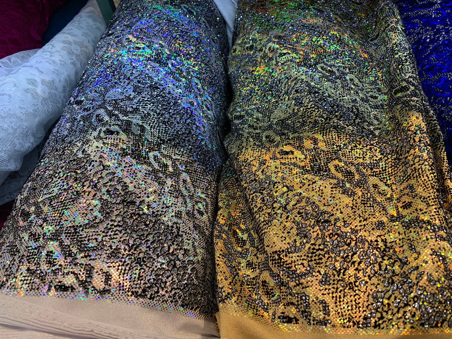 New snake design metallic nylon spandex with flocking and glitter 4way 58/60" Sold by the YD. Ships worldwide from Los Angeles California.