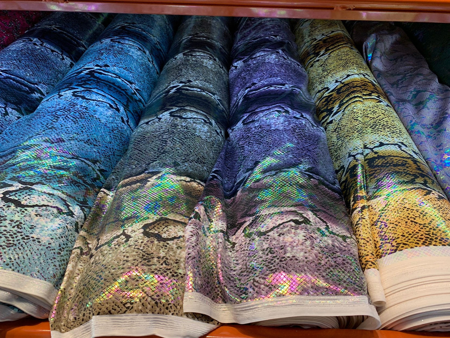 King snake design with iridescent foil nylon spandex 4way stretch 58/60" Sold by the YD. Ships worldwide from Los Angeles California USA.