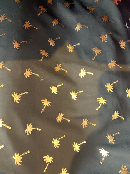New metallic print nylon spandex palm tree design 4way stretch 58/60" Sold by the YD. Ships worldwide from Los Angeles California USA.