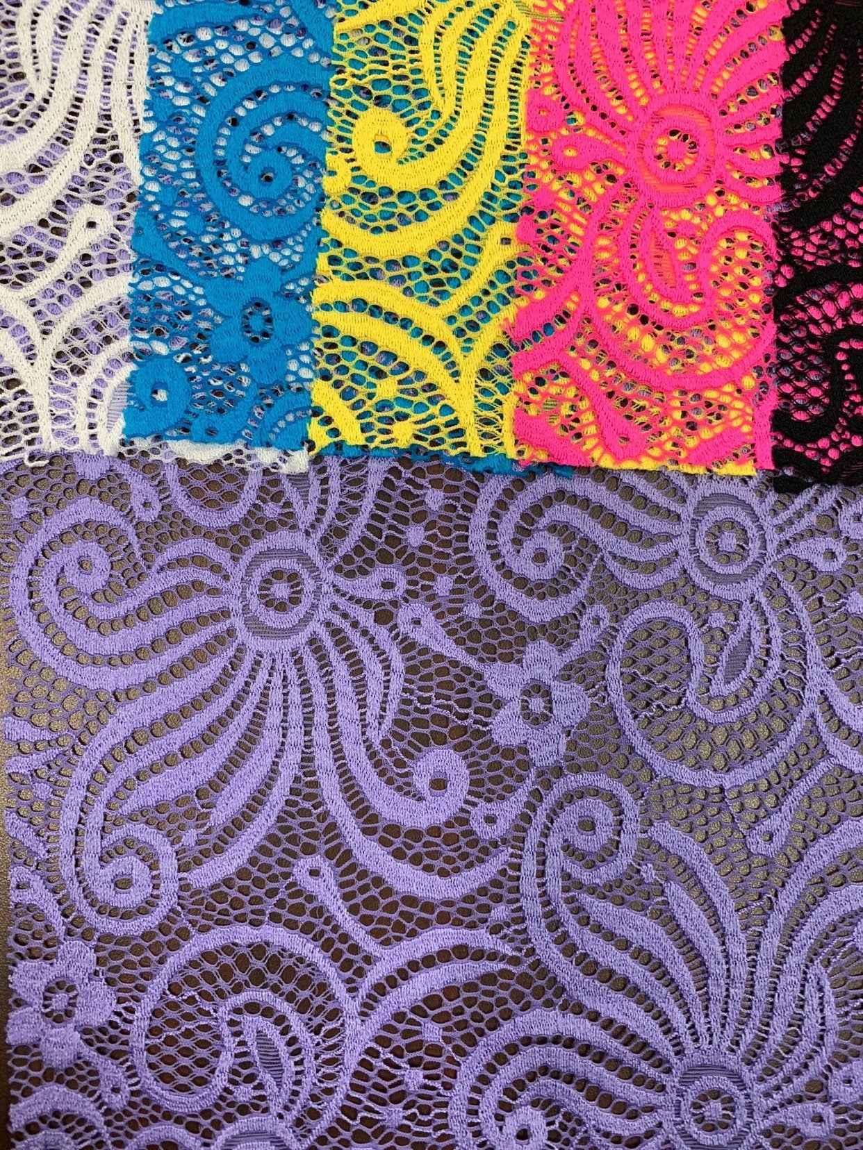New lace swirl design nylon spandex 4way stretch 58/60" Sold by the YD. Ships worldwide from Los Angeles California USA.
