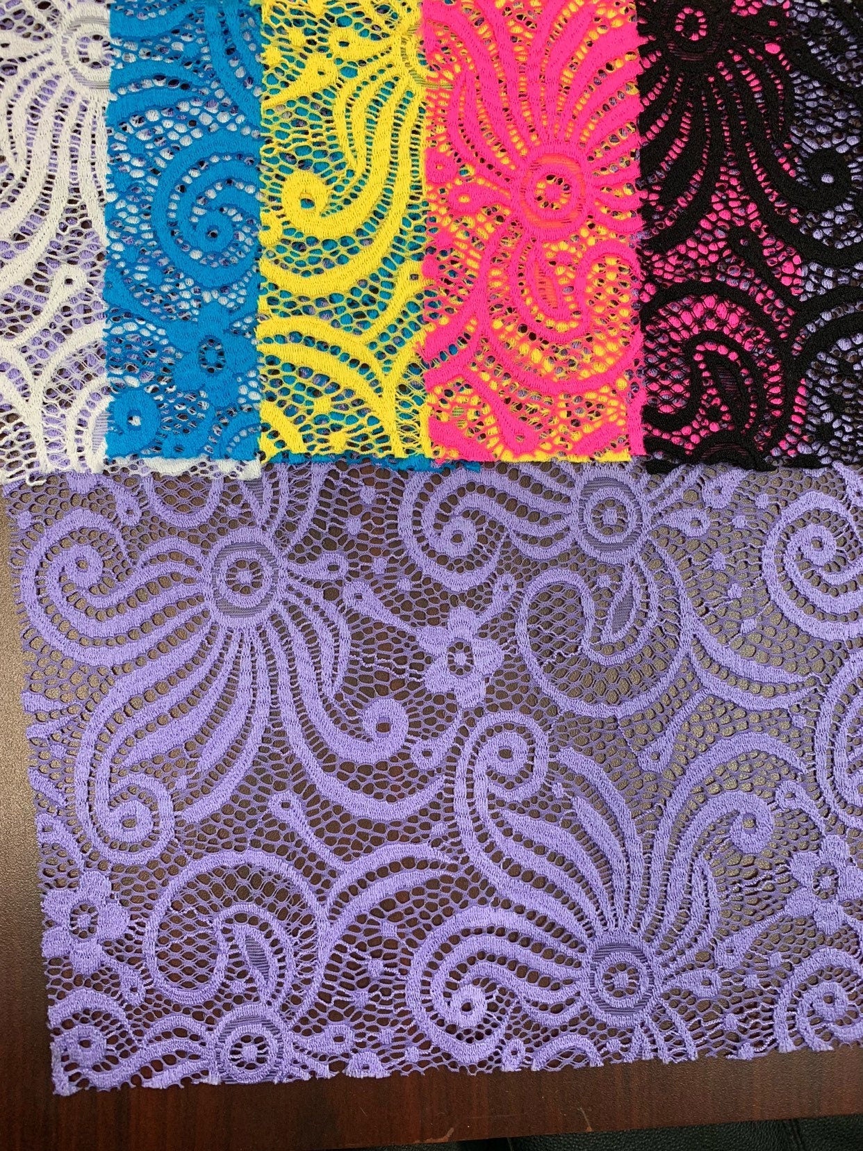 New lace swirl design nylon spandex 4way stretch 58/60" Sold by the YD. Ships worldwide from Los Angeles California USA.