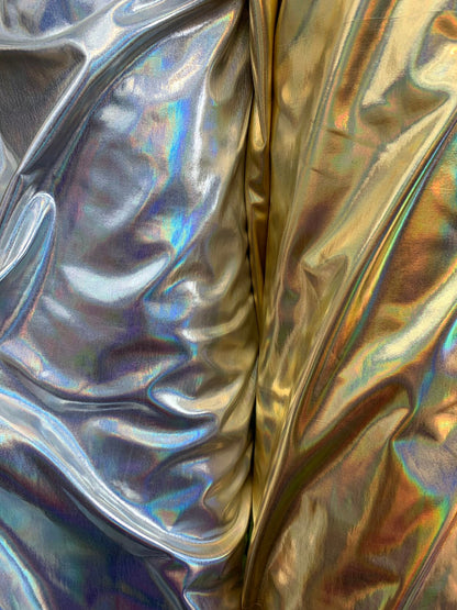 Iridescent silver all over foil metallic nylon Spandex 4way stretch 58/60" Sold by the YD. Ships worldwide from Los Angeles California USA