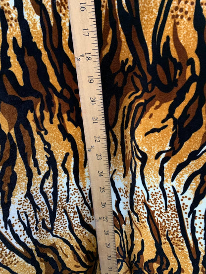 New tiger design  brown/gold heavy stretch velvet 4way 420 gsm 58/60" Sold by the YD. Ships worldwide from Los Angeles California USA.